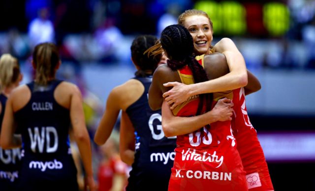 Kadeen Corbin celebrates with Helen Housby after England's 64-57 extra-time victory over New Zealand. CREDIT: Getty Images